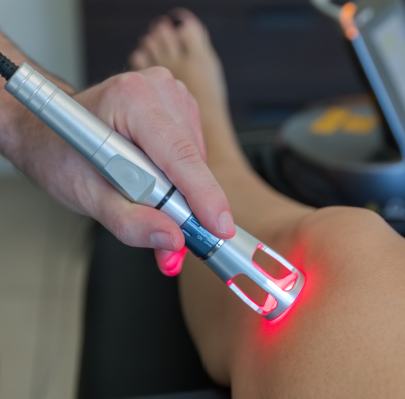 Chiropractor using laser tool
